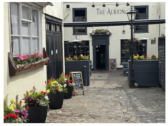 Visitors to The Albion are now greeted by flowers