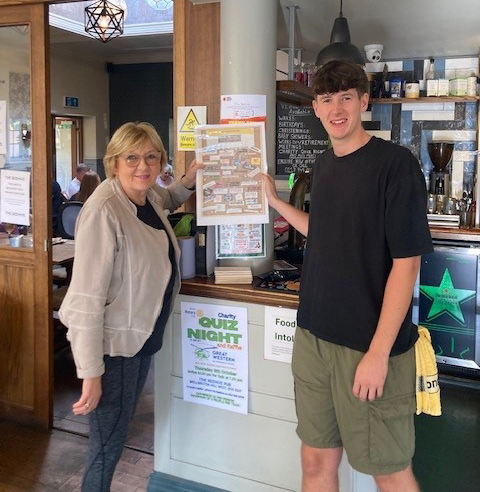 Lindsey Bowles supported by a staff member at the Beehive pub