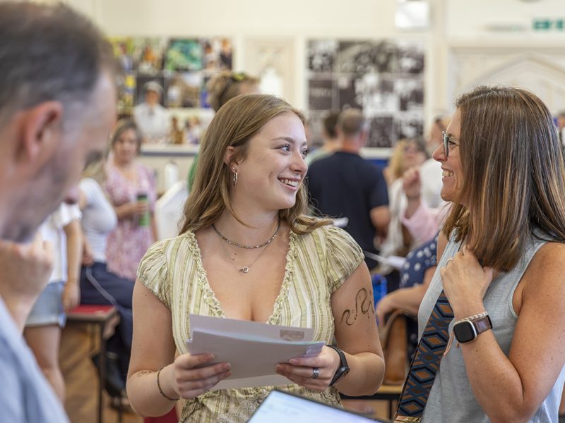Happy smiles from QEH families after results are handed out